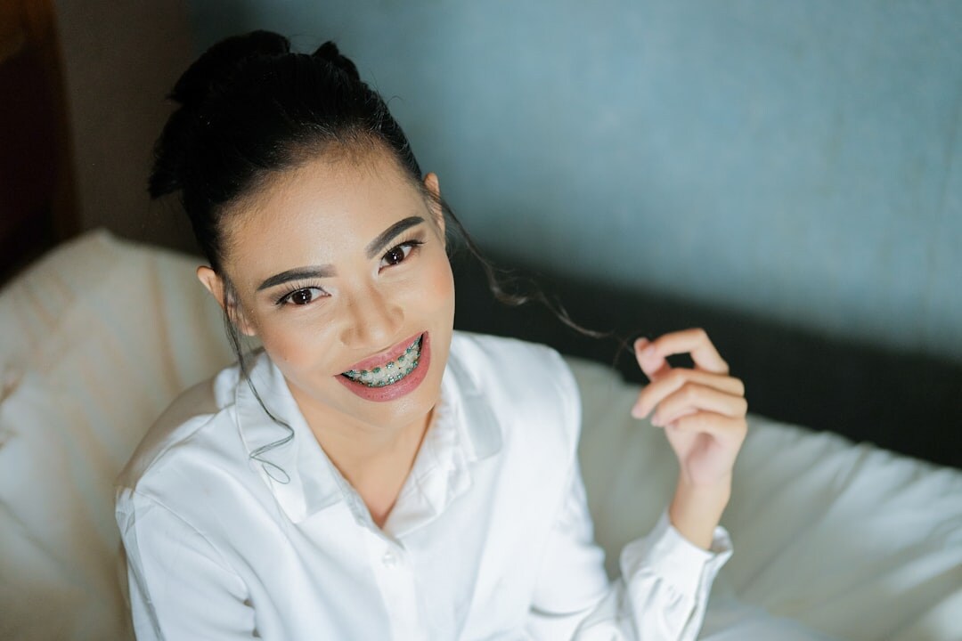 Belgian businesswoman smiling in a bright office