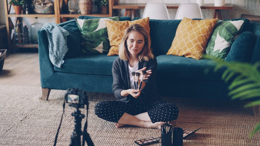 woman recording video at home
